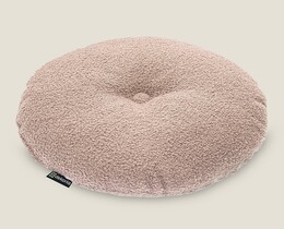Rond kussen met knoop