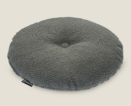 Rond kussen met knoop