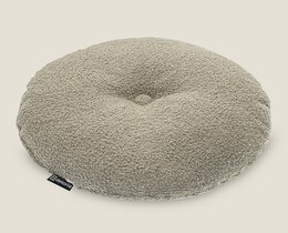 Rond kussen met knoop
